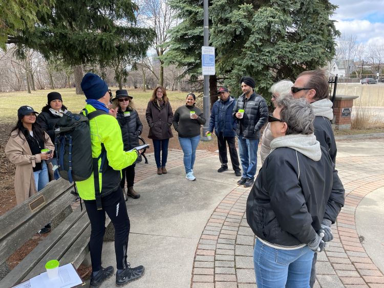 David Laing speaks to the group at the Reconnect Brampton Sip and Stroll walking tour stop in McLoughlin Parkette