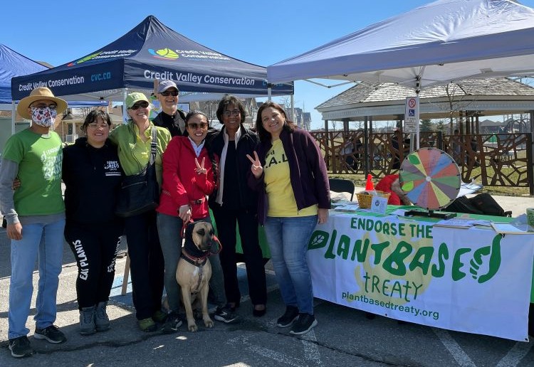 Visiting the Plant-based Treaty table at McCandless Park Earth Day event